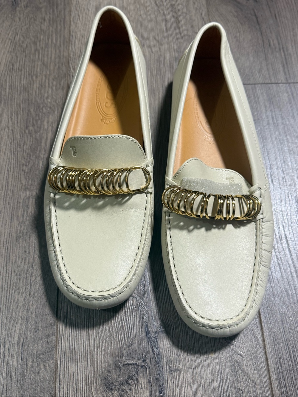 Tod's Cream Leather Loafers with Gold Ring Accent
